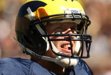 ANN ARBOR, MI - SEPTEMBER 19:  Quarterback Tate Forcier #5 of the Michigan Wolverines looks on in the game against the Eastern Michigan Eagles at Michigan Stadium on September 19, 2009 in Ann Arbor, Michigan.  Michigan won 45-17.  (Photo by Stephen Dunn/Getty Images)