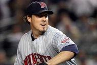NEW YORK - OCTOBER 09:  Joe Nathan #36 of the Minnesota Twins pitches against the New York Yankees in Game Two of the ALDS during the 2009 MLB Playoffs at Yankee Stadium on October 9, 2009 in the Bronx borough of New York City.  (Photo by Jim McIsaac/Getty Images)