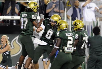 TAMPA, FL - OCTOBER 2:  Wide receiver Jessie Hester #87 of the University of South Florida Bulls celebrates a fourth-quarter touchdown pass with quarterback Matt Grothe #8 against the Pittsburgh Panthers at Raymond James Stadium on October 2, 2008 in Tampa, Florida.  (Photo by Al Messerschmidt/Getty Images)