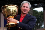 SAN FRANCISCO - OCTOBER 11:  USA Team Captain Fred Couples poses on stage at the closing ceremonies after the USA defeated the International Team 19.5 to 14.5 to win The Presidents Cup at Harding Park Golf Course on October 11, 2009 in San Francisco, California.  (Photo by David Cannon/Getty Images)