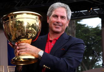 SAN FRANCISCO - OCTOBER 11:  USA Team Captain Fred Couples poses on stage at the closing ceremonies after the USA defeated the International Team 19.5 to 14.5 to win The Presidents Cup at Harding Park Golf Course on October 11, 2009 in San Francisco, California.  (Photo by David Cannon/Getty Images)