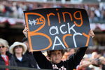 SAN FRANCISCO - APRIL 7:  A young San Francisco Giants fan holds a sign imploring the Giants to Bring Back Barry (Bonds) during the opening day game against the San Diego Padres on April 7, 2008 at AT&T Park in San Francisco, California. The Padres defeated the Giants 8-4.  (Photo by Greg Trott/Getty Images)