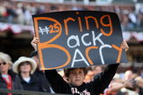 SAN FRANCISCO - APRIL 7:  A young San Francisco Giants fan holds a sign imploring the Giants to Bring Back Barry (Bonds) during the opening day game against the San Diego Padres on April 7, 2008 at AT&T Park in San Francisco, California. The Padres defeated the Giants 8-4.  (Photo by Greg Trott/Getty Images)