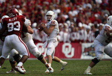 DALLAS - OCTOBER 11:  Quarterback Colt McCoy #12 of the Texas Longhorns drops back to pass against the Oklahoma Sooners during the Red River Rivalry at the Cotton Bowl on October 11, 2008 in Dallas, Texas.  The Longhorns defeated the Sooners 45-35.  (Photo by Ronald Martinez/Getty Images)