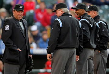DENVER - APRIL 11:  (L-R) Umpire crew chief Gerry Davis prepares to oversee homeplate as his crew Brian Gorman, CB Bucknor and Mike Everitt prepare to take the field as the Philadelphia Phillies face the Colorado Rockies during MLB action at Coors Field on April 11, 2009 in Denver, Colorado. The Phillies defeated the Rockies 8-4.  (Photo by Doug Pensinger/Getty Images)