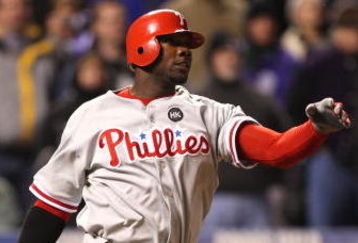 DENVER - OCTOBER 12: Ryan Howard #6 of the Philadelphia Phillies hits a two run double in the ninth inning against the Colorado Rockies in Game Four of the NLDS during the 2009 MLB Playoffs at Coors Field on October 12, 2009 in Denver, Colorado. (Photo by Jed Jacobsohn/Getty Images)