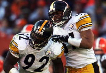CLEVELAND,OH - NOVEMBER 14: James Harrison #92 of the Pittsburgh Steelers is congradulated by James Farrior #51 after a defensive stop during the game against the Cleveland Browns at Cleveland Browns Stadium on November 14, 2004 in Cleveland, Ohio.    (Photo by Andy Lyons/Getty Images) 