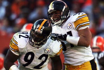 CLEVELAND,OH - NOVEMBER 14: James Harrison #92 of the Pittsburgh Steelers is congradulated by James Farrior #51 after a defensive stop during the game against the Cleveland Browns at Cleveland Browns Stadium on November 14, 2004 in Cleveland, Ohio.    (Photo by Andy Lyons/Getty Images) 