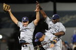 LOS ANGELES, CA - AUGUST 05: Ryan Braun #8, Mike Camron #25, and Jody Gerut #22  of the Milwaukee Brewers celebrate a 4-1 victory over the Los Angeles Dodgers at Dodger Stadium on August 5, 2009 in Los Angeles, California.  (Photo by Harry How/Getty Images)