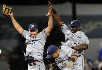 LOS ANGELES, CA - AUGUST 05: Ryan Braun #8, Mike Camron #25, and Jody Gerut #22  of the Milwaukee Brewers celebrate a 4-1 victory over the Los Angeles Dodgers at Dodger Stadium on August 5, 2009 in Los Angeles, California.  (Photo by Harry How/Getty Images)