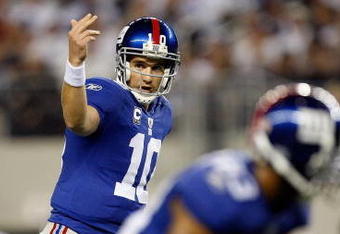 ARLINGTON, TX - SEPTEMBER 20:  Quarterback Eli Manning #10 of the New York Giants during play against the Dallas Cowboys at Cowboys Stadium on September 20, 2009 in Arlington, Texas.  (Photo by Ronald Martinez/Getty Images)