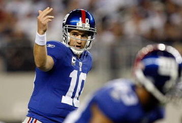 ARLINGTON, TX - SEPTEMBER 20:  Quarterback Eli Manning #10 of the New York Giants during play against the Dallas Cowboys at Cowboys Stadium on September 20, 2009 in Arlington, Texas.  (Photo by Ronald Martinez/Getty Images)