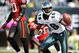 PHILADELPHIA - OCTOBER 11:  Jeremy Maclin #18 of the Philadelphia Eagles celebrates his touchdown in front of Will Allen #26 of the Tampa Bay Buccaneers at Lincoln Financial Field on October 11, 2009 in Philadelphia, Pennsylvania.  (Photo by Jeff Zelevansky/Getty Images)
