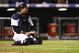 DENVER - OCTOBER 12: Yorvit Torrealba #8 of the Colorado Rockies looks on in the ninth inning against the Philadelphia Phillies in Game Four of the NLDS during the 2009 MLB Playoffs at Coors Field on October 12, 2009 in Denver, Colorado. (Photo by Jed Jacobsohn/Getty Images)