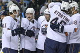 NASHVILLE, TN - OCTOBER 12:   Defenseman Taylor Chorney #41, right wing Zack Stortini #46, and left wing Ethan Moreau #19 of the Edmonton Oilers celebrate with their teammates scoring a goal against the Nashville Predators on October 12, 2009 at the Sommet Center in Nashville, Tennessee.  (Photo by Frederick Breedon/Getty Images)