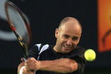MELBOURNE - JANUARY 23:  Andre Agassi of the USA in action against Wayne Ferreira of South Africa during the Australian Open Tennis Championships at Melbourne Park in Melbourne, Australia on January 23, 2003. (Photo by Clive Brunskill/Getty Images).