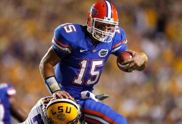 BATON ROUGE, LA - OCTOBER 10:  Patrick Peterson #7 of the Louisiana State University Tigers tackles quarterback Tim Tebow #15 of the Florida Gators at Tiger Stadium on October 10, 2009 in Baton Rouge, Louisiana.  (Photo by Kevin C. Cox/Getty Images)