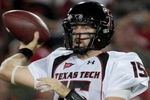HOUSTON - SEPTEMBER 26:  Quarterback Taylor Potts #15 of the Texas Tech Red Raiders drops back in the pocket against the Houston Cougars at Robertson Stadium on September 26, 2009 in Houston, Texas.  (Photo by Thomas B. Shea/Getty Images)