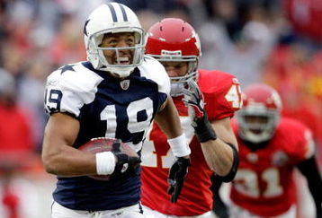 KANSAS CITY, MO - OCTOBER 11:  Miles Austin #19 of the Dallas Cowboys carries the ball into the endzone for a touchdown to win the game in overtime during the game against the Kansas City Chiefs on October 11, 2009 at Arrowhead Stadiumin Kansas City, Missouri.  (Photo by Jamie Squire/Getty Images)