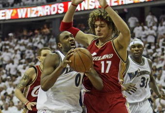 WASHINGTON - APRIL 27: Gilbert Arenas #0 of the Washington Wizards drives to the net while getting fouled by Anderson Varejao #17 of the Cleveland Cavaliers in Game Four of the Eastern Conference Quarterfinals during the 2008 NBA Playoffs at the Verizon Center on April 27, 2008 in Washington, DC.  NOTE TO USER: User expressly acknowledges and agrees that, by downloading and or using this photograph, User is consenting to the terms and conditions of the Getty Images License Agreement. (Photo by Drew Hallowell/Getty Images)