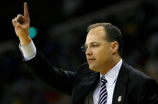 NEW ORLEANS - MARCH 18:  Head coach Mark Fox of the Nevada Wolf Pack signals from the sidelines during the second half against the Memphis Tigers during in two of the NCAA Men's Basketball Tournament at the New Orleans Arena on March 18, 2007 in New Orleans, Louisiana.  (Photo by Chris Graythen/Getty Images)