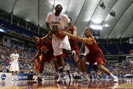 MINNEAPOLIS - MARCH 22: Draymond Green #23 of the Michigan State Spartans goes up for a shot attempt against DeMarr DeRozan #10, Nikola Vucevic #5 and Daniel Hackett #13 of the USC Trojans during the second round of the NCAA Division I Men's Basketball Tournament at the Hubert H. Humphrey Metrodome on March 22, 2009 in Minneapolis, Minnesota. (Photo by Jonathan Daniel/Getty Images)