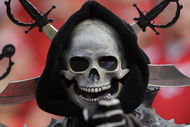 KANSAS CITY, MO - SEPTEMBER 20: An Oakland Raiders fan looks on during the game against the Kansas City Chiefs at Arrowhead Stadium on September 20, 2009 in Kansas City, Missouri. (Photo by Jamie Squire/Getty Images)