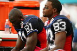 MIAMI - OCTOBER 04:  Wide receivers Terrell Owens #81 and Lee Evans #83 of the Buffalo Bills react on the bench late in the fourth quarter against the Miami Dolphins at Land Shark Stadium on October 4, 2009 in Miami, Florida. The Dolphins defeated the Bills 38-10.  (Photo by Doug Benc/Getty Images)