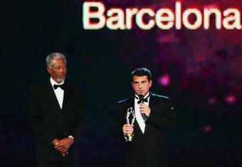BARCELONA, SPAIN - APRIL 02:  Actor Morgan Freeman listens as Joan Laporta, President of FC Barcelona accepts the Laureus Spirit Of Sport Award during the Laureus Sports Awards at the Palau Sant Jordi on April 2, 2007 in Barcelona, Spain. (Photo by Jamie McDonald/Getty Images for Laureus)