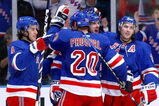 NEW YORK - OCTOBER 11: Ales Kotalik #12 of the New York Rangers is congratulated by team mate Vinny Prospal #20 after scoring a goal against the Anaheim Ducks during their game on October 11, 2009 at Madison Square Garden in New York City. (Photo by Chris McGrath/Getty Images)