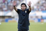 BUENOS AIRES, BUENOS AIRES - MARCH 28: Argentine manager Diego Maradona waves to the fans prior to the 2010 FIFA World Cup South African qualifier match between Argentina and Venezuela at River Plate Stadium on March 28, 2009 in Buenos Aires, Argentina.  (Photo by Photogamma/Getty Images)