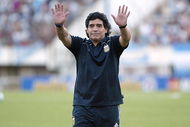 BUENOS AIRES, BUENOS AIRES - MARCH 28: Argentine manager Diego Maradona waves to the fans prior to the 2010 FIFA World Cup South African qualifier match between Argentina and Venezuela at River Plate Stadium on March 28, 2009 in Buenos Aires, Argentina.  (Photo by Photogamma/Getty Images)