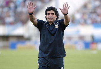 BUENOS AIRES, BUENOS AIRES - MARCH 28: Argentine manager Diego Maradona waves to the fans prior to the 2010 FIFA World Cup South African qualifier match between Argentina and Venezuela at River Plate Stadium on March 28, 2009 in Buenos Aires, Argentina.  (Photo by Photogamma/Getty Images)