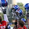 LAWRENCE, KS - SEPTEMBER 22:   Kansas Jayhawk players hoist their helmets as the campus looms in the background prior to the start of the game against the Florida International Golden Panthers on September 22, 2007 at Memorial Stadium in Lawrence, Kansas.  (Photo by Jamie Squire/Getty Images)