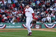 BOSTON - OCTOBER 11: Pitcher Jonathan Papelbon #58 of the Boston Red Sox reacts after being taken out of the game after blowing a save in the ninth inning against the Los Angeles Angels of Anaheim in Game Three of the ALDS during the 2009 MLB Playoffs at Fenway Park on October 11, 2009 in Boston, Massachusetts. The Angels defeated the Red Sox 7-6. (Photo by Jim Rogash/Getty Images)