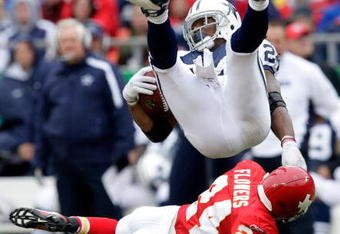 KANSAS CITY, MO - OCTOBER 11:  Marion Barber #24 of the Dallas Cowboys is upended by Brandon Flowers #24 of the Kansas City Chiefs during the game on October 11, 2009 at Arrowhead Stadium in Kansas City, Missouri.  (Photo by Jamie Squire/Getty Images)