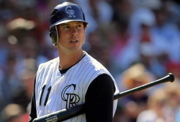 DENVER - AUGUST 27:  Brad Hawpe #11 of the Colorado Rockies heads to the dugout after being called out on strikes in the sixth inning against the Los Angeles Dodgers at Coors Field on August 27, 2009 in Denver, Colorado. The Dodgers defeated the Rockies 3-2.  (Photo by Doug Pensinger/Getty Images)