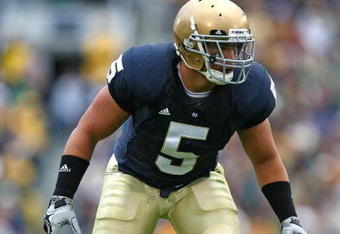 SOUTH BEND, IN - OCTOBER 03: Manti Te'o #5 of the Notre Dame Fighting Irish awaits the start of play against the Washington Huskies on October 3, 2009 at Notre Dame Stadium in South Bend, Indiana. Notre Dame defeated Washington 37-30 in overtime. (Photo by Jonathan Daniel/Getty Images)