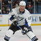 UNIONDALE, NY - APRIL 04: Ryan Malone #12 of the Tampa Bay Lightning moves the puck against the New York Islanders in a National Hockey League game at Nassau Coliseum on April 4, 2009 in Uniondale, New York. (Photo by Paul Bereswill/Getty Images)