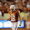 AUSTIN, TX - OCTOBER 10:  Quarterback Colt McCoy #12 of the Texas Longhorns pumps his fists after throwing a touchdown pass against the Colorado Buffaloes in the final minute of the second quarter on October 10, 2009 at Darrell K Royal-Texas Memorial Stadium in Austin, Texas.  Texas won 38-14.  (Photo by Brian Bahr/Getty Images)