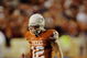 AUSTIN, TX - OCTOBER 10:  Quarterback Colt McCoy #12 of the Texas Longhorns pumps his fists after throwing a touchdown pass against the Colorado Buffaloes in the final minute of the second quarter on October 10, 2009 at Darrell K Royal-Texas Memorial Stadium in Austin, Texas.  Texas won 38-14.  (Photo by Brian Bahr/Getty Images)