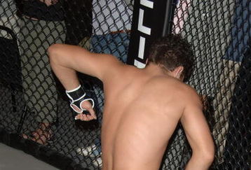 STUDIO CITY, CA - MAY 19:  MMA fighters Jake Shields (bottom) and Nick Diaz demonstrate MMA fighting techniques at CBS's 'Elite XC Saturday Night Fights' Press Conference at CBS Radford Studios on May 19, 2008 in Studio City, California.  (Photo by Stephen Shugerman/Getty Images)