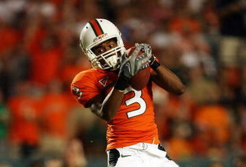 FORT LAUDERDALE, FL - OCTOBER 03: Wide receiver Travis Benjamin #3 of the Miami Hurricanes catches a touchdown pass against the Oklahoma Sooners at Land Shark Stadium on October 3, 2009 in Fort Lauderdale, Florida. Miami defeated Oklahoma 21-20. (Photo by Doug Benc/Getty Images)
