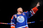 EDMONTON, CANADA - FEBRUARY 27:  Former Edmonton Oilers great Mark Messier #11 salutes his fans as he takes a final skate around the ice during a ceremony to raise his #11 banner to the rafters of Rexall Place prior to the Oilers game against the Phoenix Coyotes on February 27, 2007 at Rexall Place in Edmonton, Alberta, Canada. Messier's #11 was retired to the rafters of Rexall Place prior to the game.  (Photo by Tim Smith/Getty Images)   