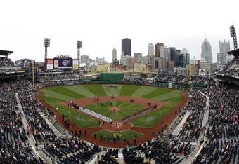 PITTSBURGH - APRIL 13: The Pittsburgh Pirates and Houston Astros look on while the National Anthem is performed during the Pirates Home Opener at PNC Park April 13, 2009 in Pittsburgh, Pennsylvania.  (Photo by Gregory Shamus/Getty Images)