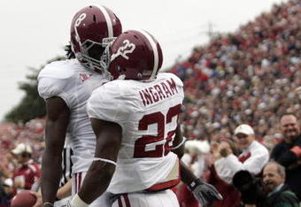 OXFORD, MS - OCTOBER 10:  Mark Ingram #22 and Julio Jones #8 of the Alabama Crimson Tide react after Ingram scored on a 36-yard touchdown during their game against the Mississippi Rebels at Vaught-Hemingway Stadium on October 10, 2009 in Oxford, Mississippi. (Photo by Dave Martin/Getty Images)
