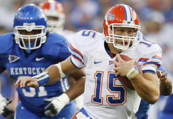LEXINGTON, KY - SEPTEMBER 26: Quarterback Tim Tebow #15 of the Florida Gators rushes in for a two yard touchdown in the first quarter of the game against the Kentucky Wildcats at Commonwealth Stadium on September 26, 2009 in Lexington, Kentucky. (Photo by Andy Lyons/Getty Images)