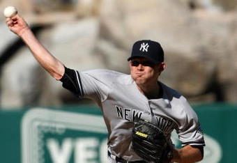ANAHEIM, CA - SEPTEMBER 23:  Pitcher Ian Kennedy #38 of the New York Yankees throws a pitch against the Los Angeles Angels of Anaheim on September 23, 2009 at Angel Stadium in Anaheim, California..  The Yankees won 3-2.  (Photo by Stephen Dunn/Getty Images)