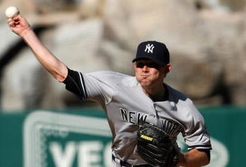 ANAHEIM, CA - SEPTEMBER 23:  Pitcher Ian Kennedy #38 of the New York Yankees throws a pitch against the Los Angeles Angels of Anaheim on September 23, 2009 at Angel Stadium in Anaheim, California..  The Yankees won 3-2.  (Photo by Stephen Dunn/Getty Images)