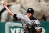 ANAHEIM, CA - SEPTEMBER 23:  Pitcher Ian Kennedy #38 of the New York Yankees throws a pitch against the Los Angeles Angels of Anaheim on September 23, 2009 at Angel Stadium in Anaheim, California..  The Yankees won 3-2.  (Photo by Stephen Dunn/Getty Images)